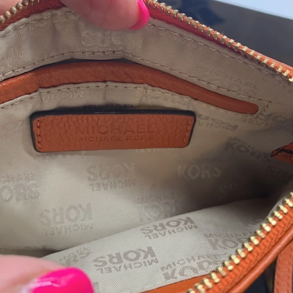 Michael Michael Kors Orange Gold Wristlet. SM1714